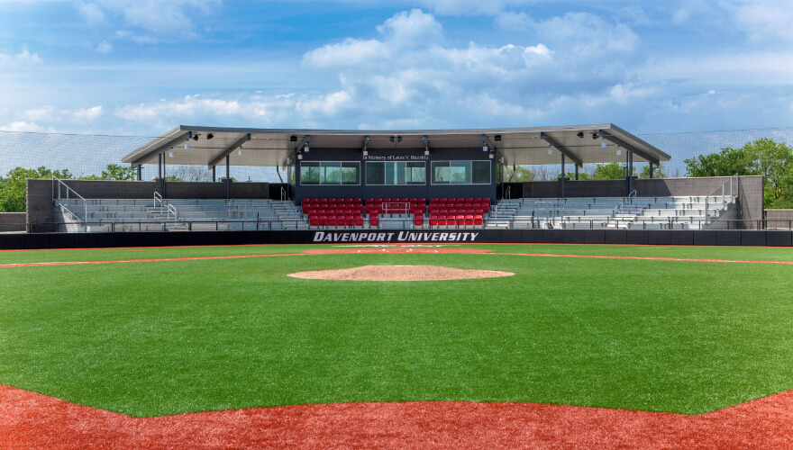 turf baseball field with stadium seating