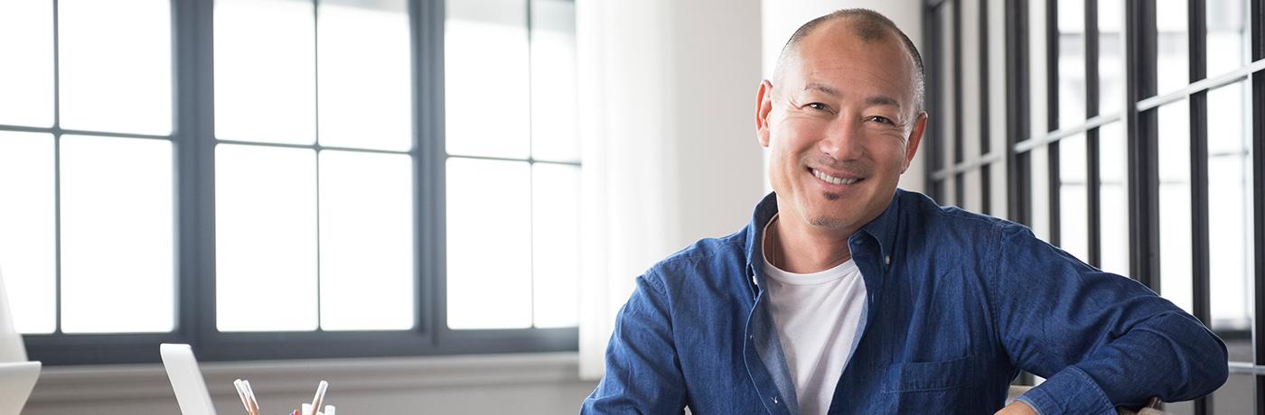 This is an image of a male at his desk