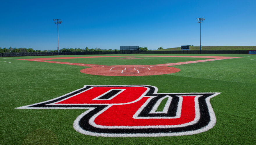 turf baseball field with DU logo