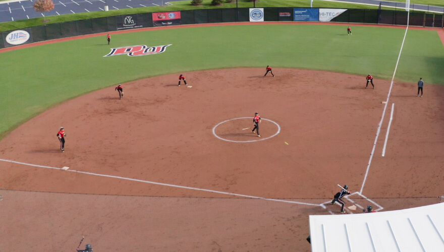 softball team on turf softball field