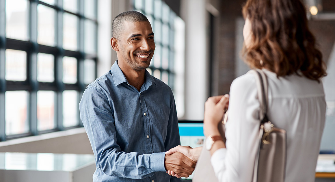 Two professionals shaking hands