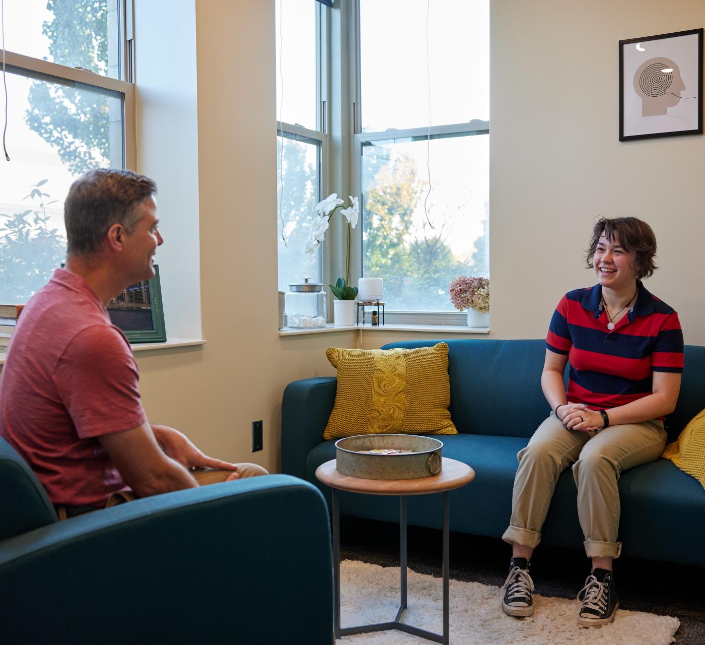 Inside the Wellness Center with a counselor and student