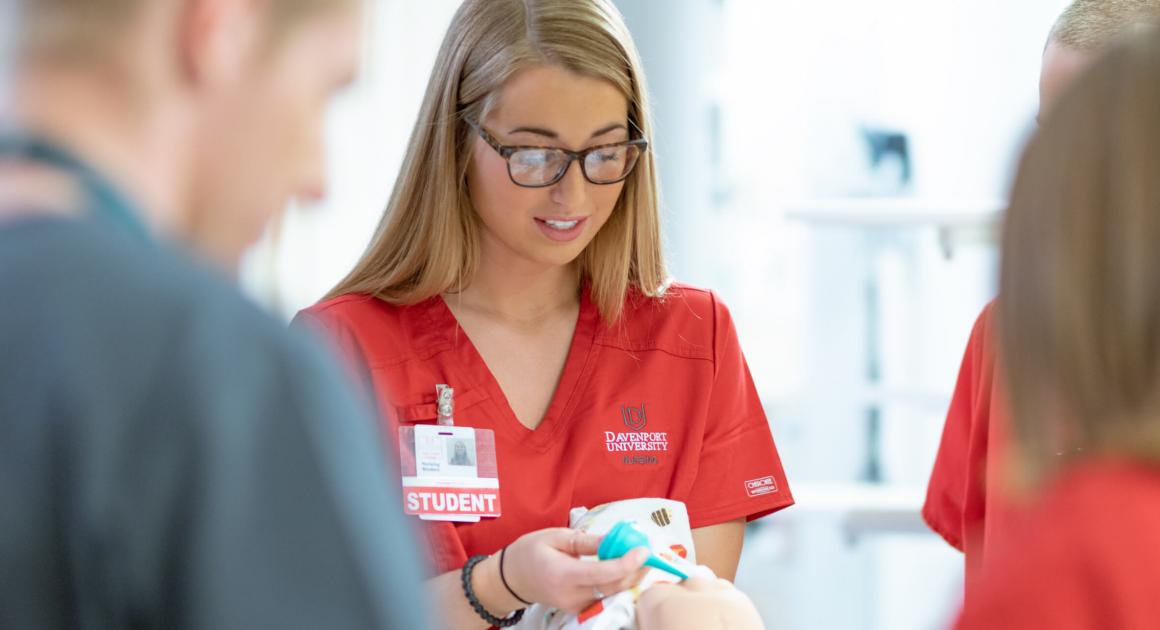 Female Nursing Student in Simulation Lab