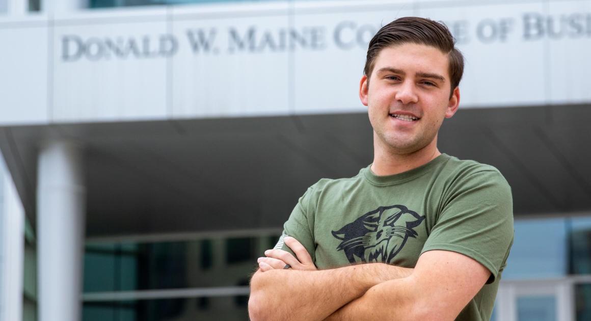 Student outside of a building