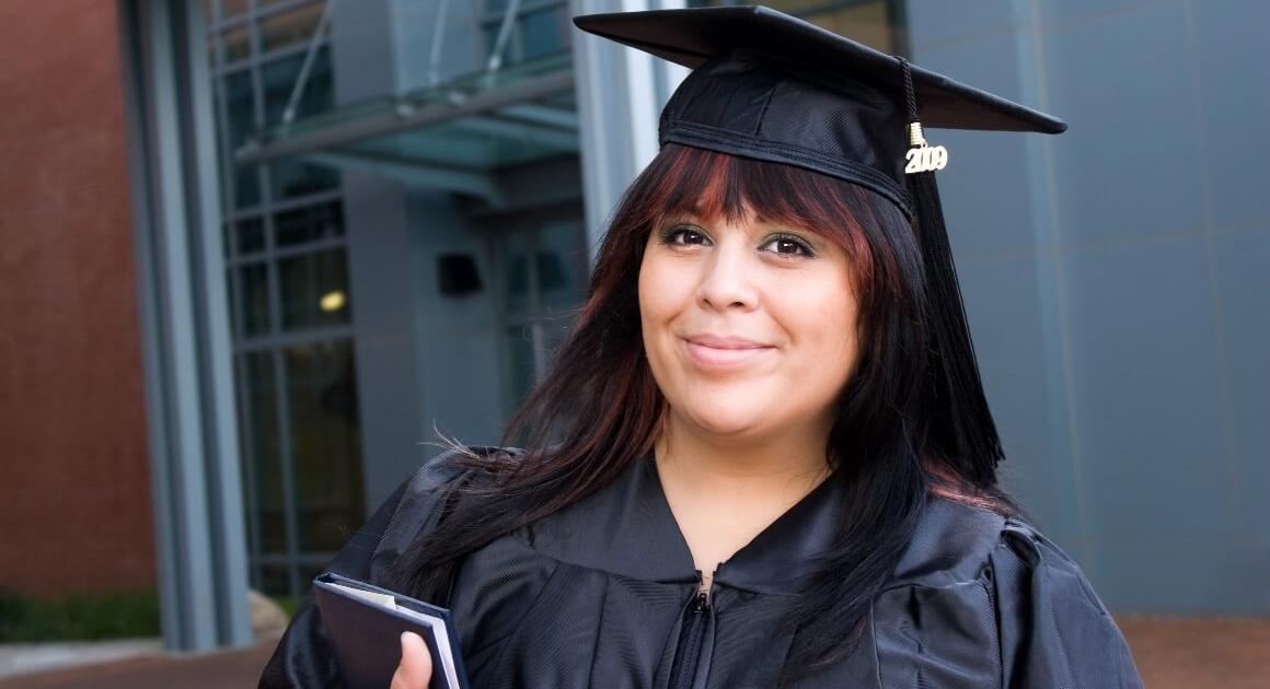 Student in graduation cap and gown