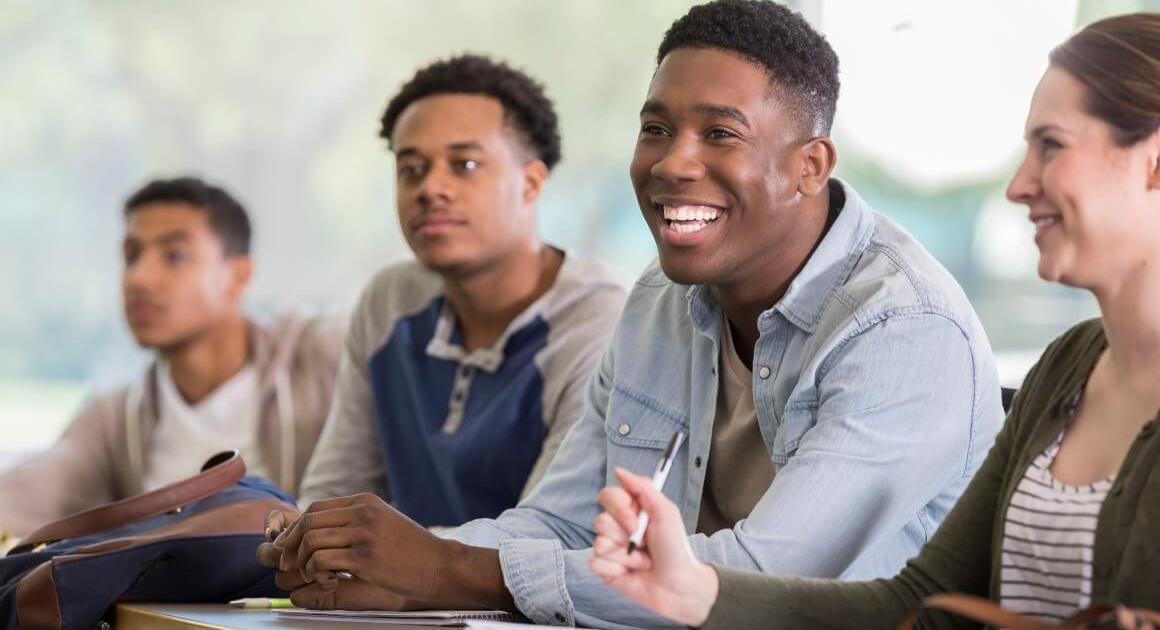 Four students in a classroom