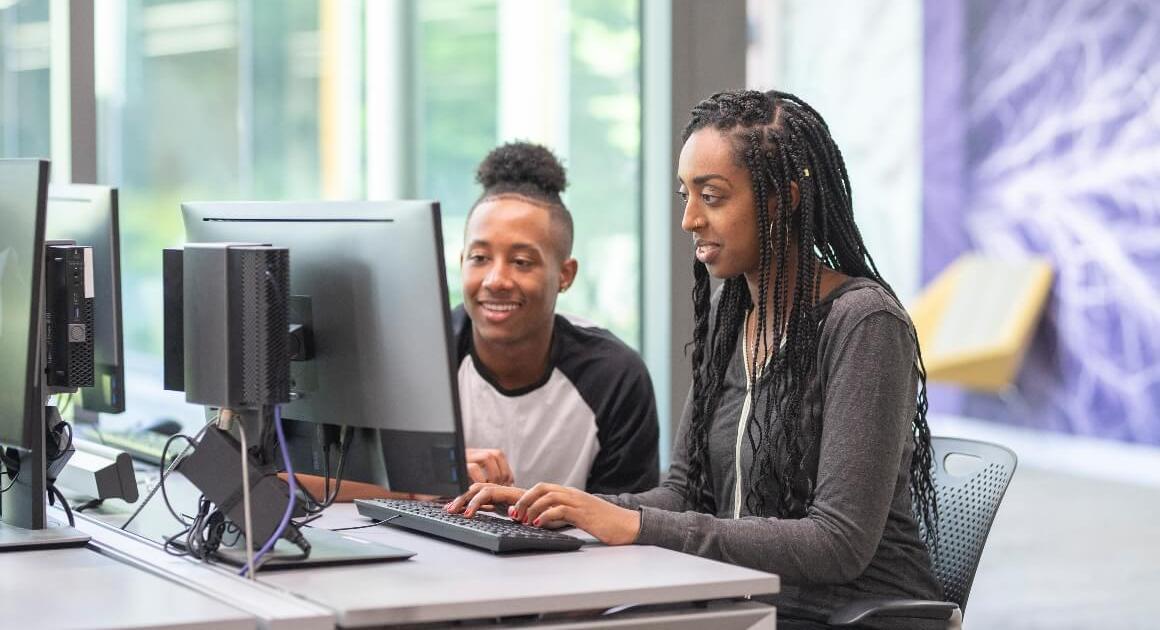 2 students in front of a computer