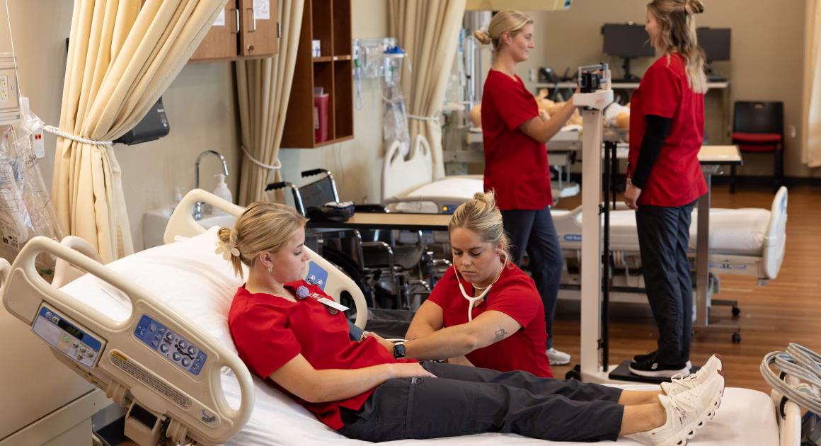 Nursing students in the simulation lab